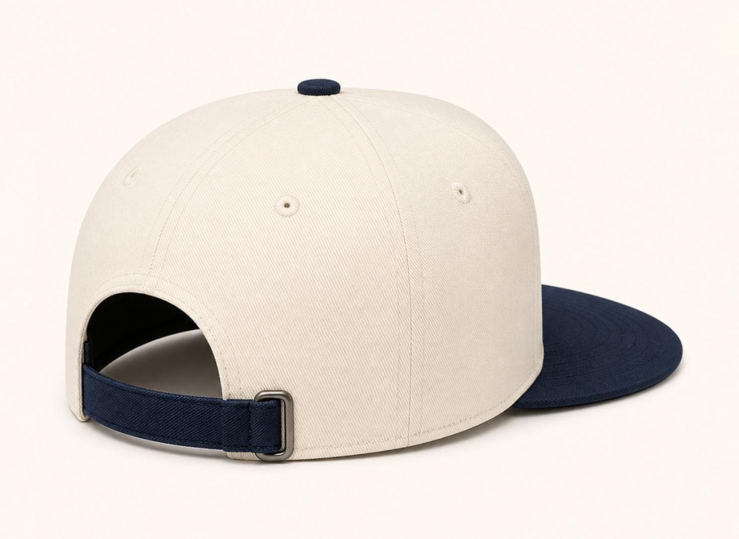 5P Ringbelt HFS cream 5-panel high profile flat bill cap back view with navy visor and rectangular metal ringbelt closure