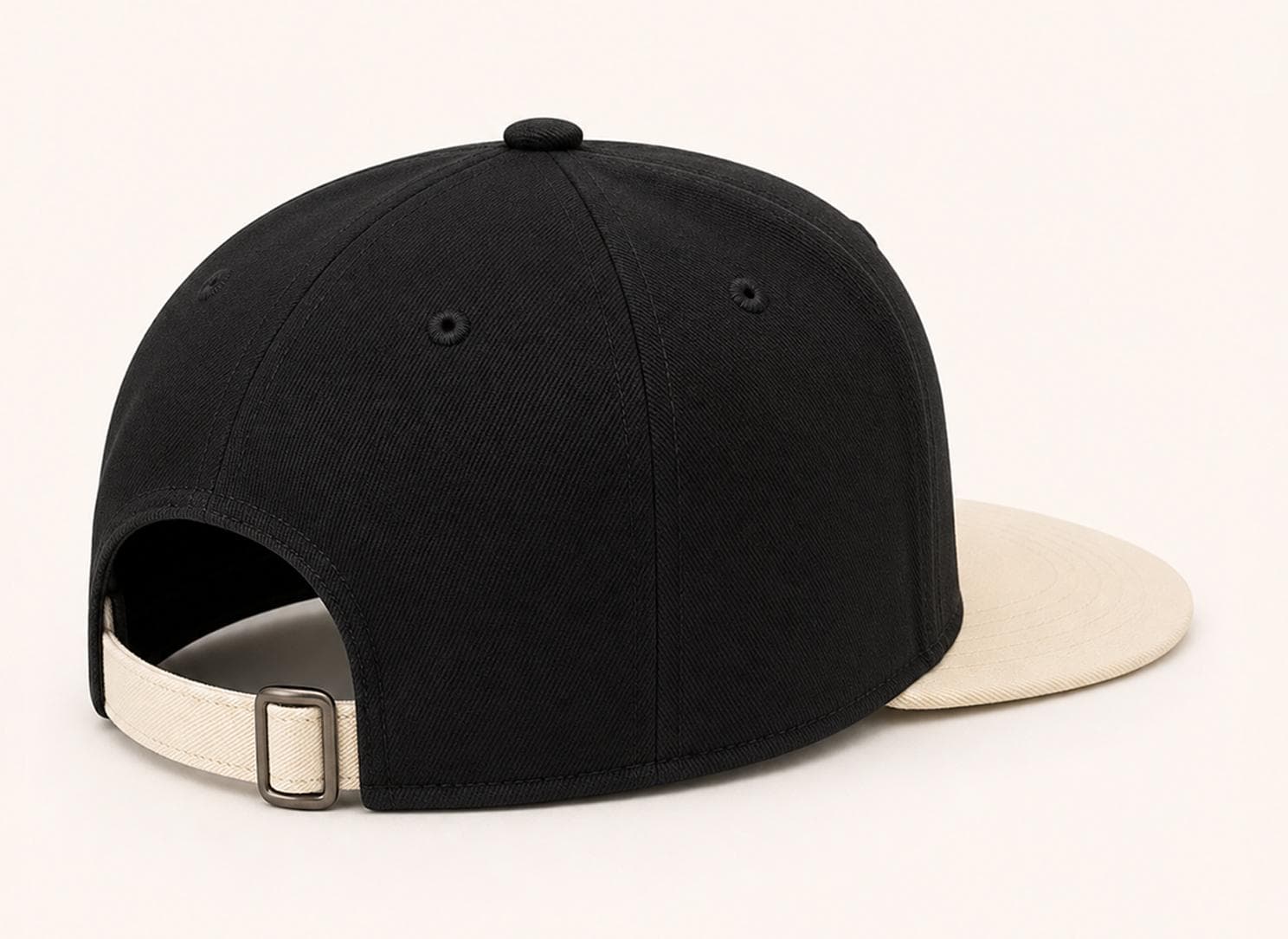 6P Ringbelt HFS black 6-panel high profile flat bill cap back view with cream visor and rectangular metal ringbelt closure